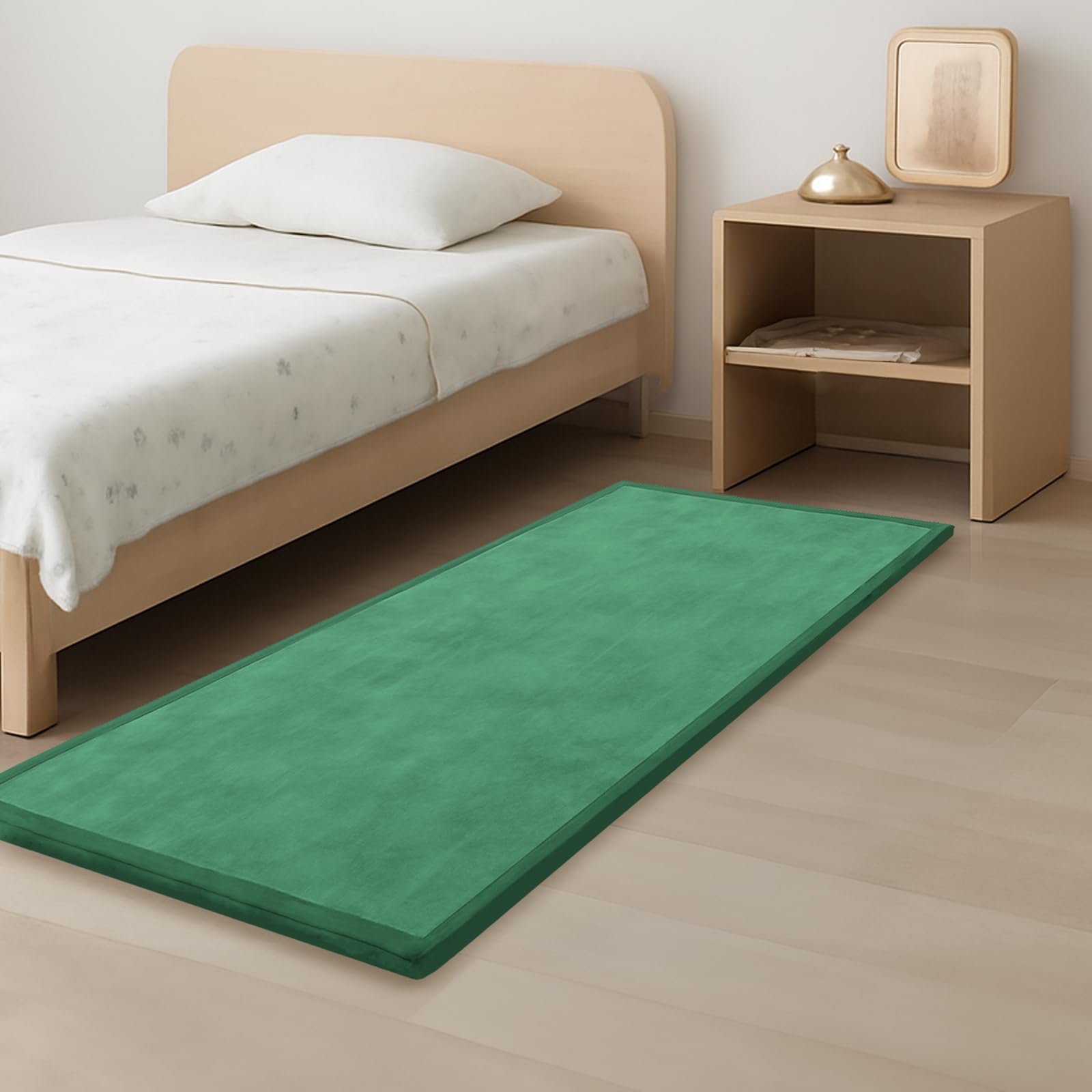 PaPaMat Emerald foam tummy time mat offers soft support for infant play.