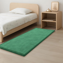 PaPaMat Emerald foam tummy time mat offers soft support for infant play.