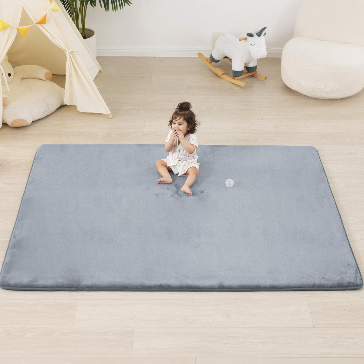 PaPaMat unrolled full mat on floor ready for play and tummy time.