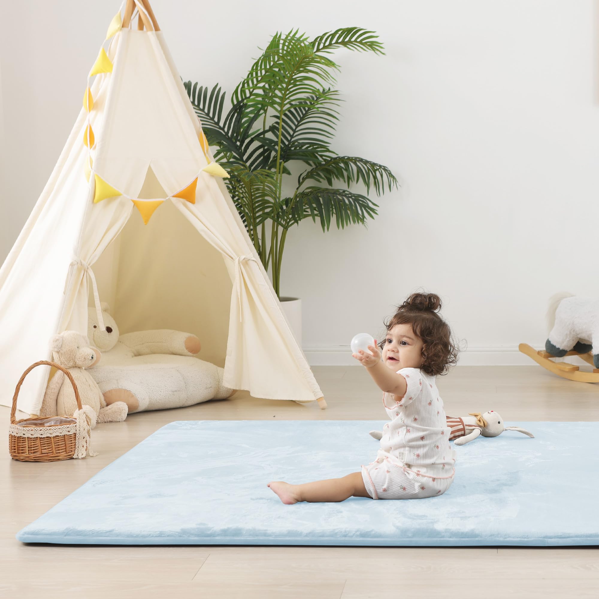 PaPaMat living-room setup shows durable mat for infants to toddlers.