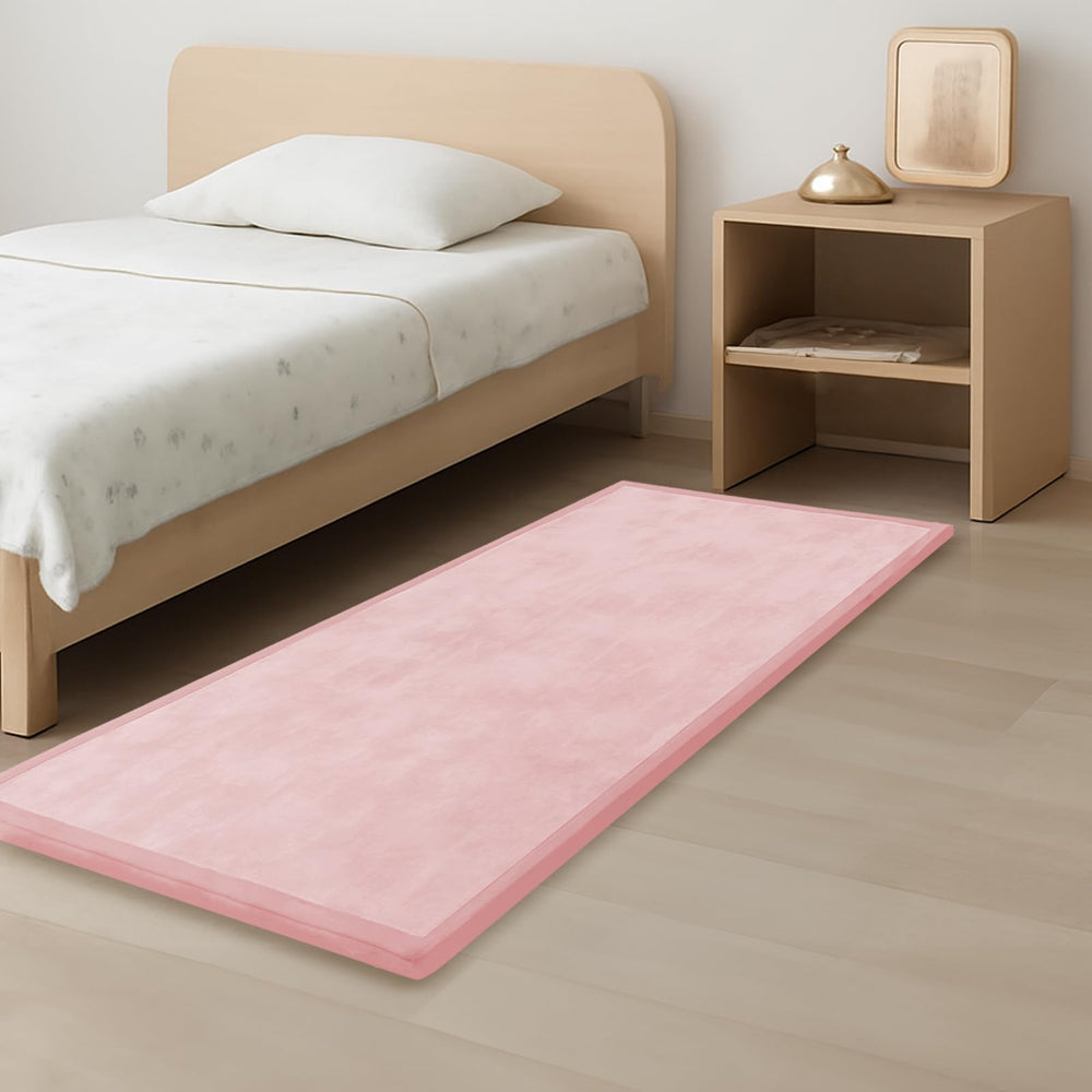 PaPaMat safety-certified fall-protection pink mat provides a soft bedside barrier.