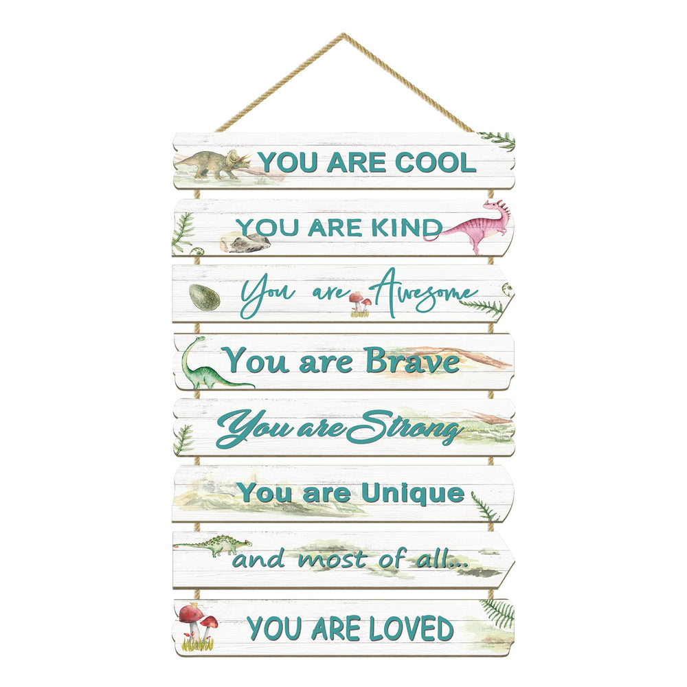 Paquesta dinosaur wall art eight pieces enhances a boy's room with inspirational decor.