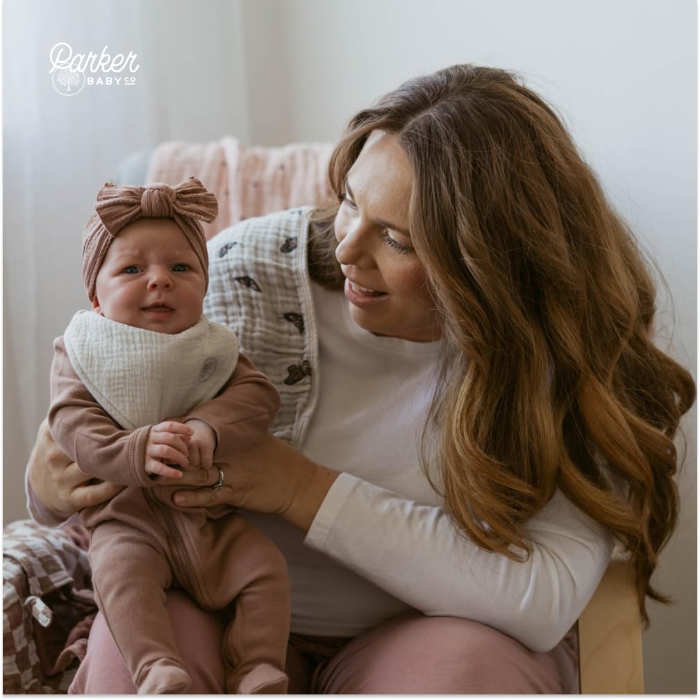 Parker Baby Co. adjustable snaps ensure secure, comfortable fit through growth.