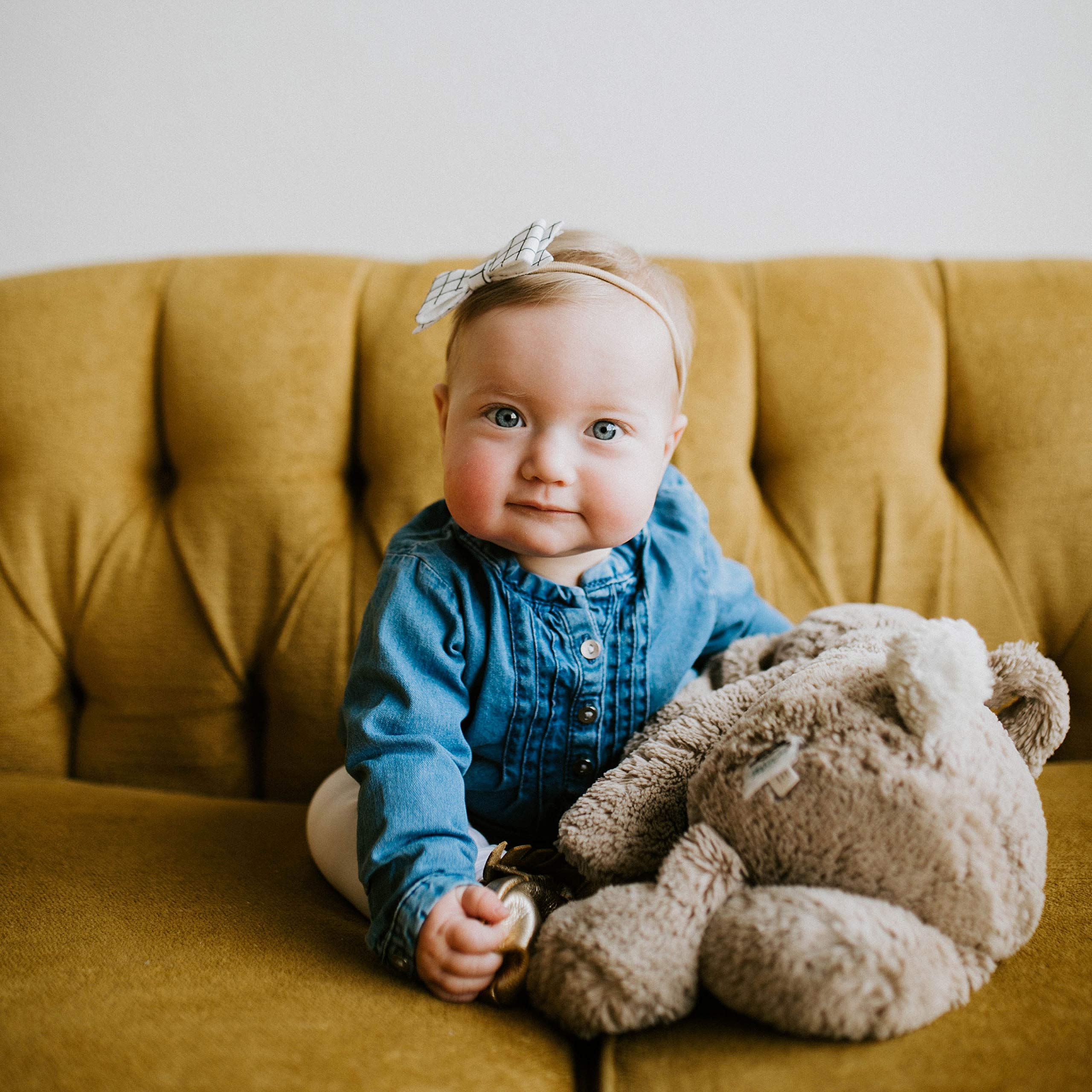 Parker Baby Co. The Anne Set lavender bow enhances photo moments.