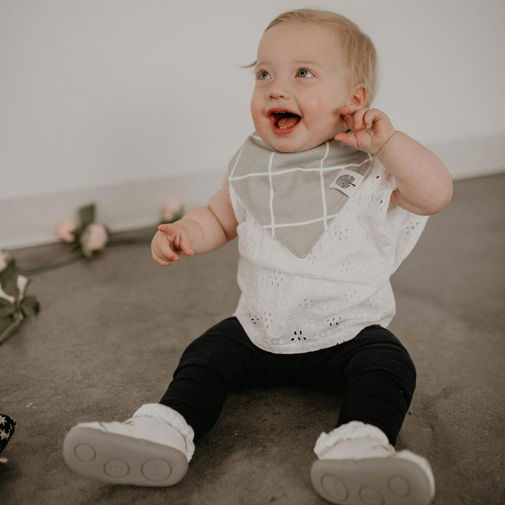 Parker Baby Co. bibs protect outfits during meals and snacks.