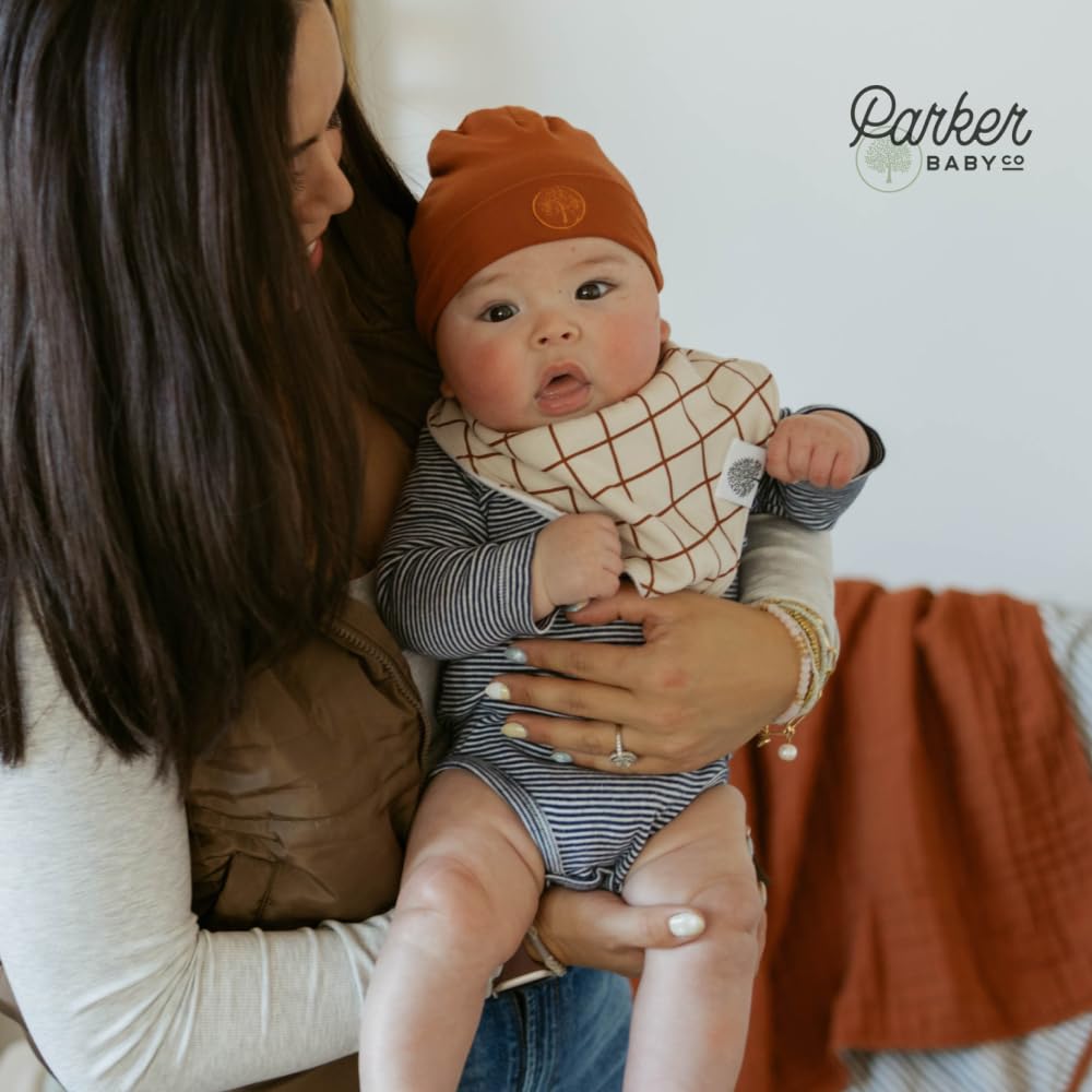 Parker Baby Co bandana bibs worn by baby, stylish and practical