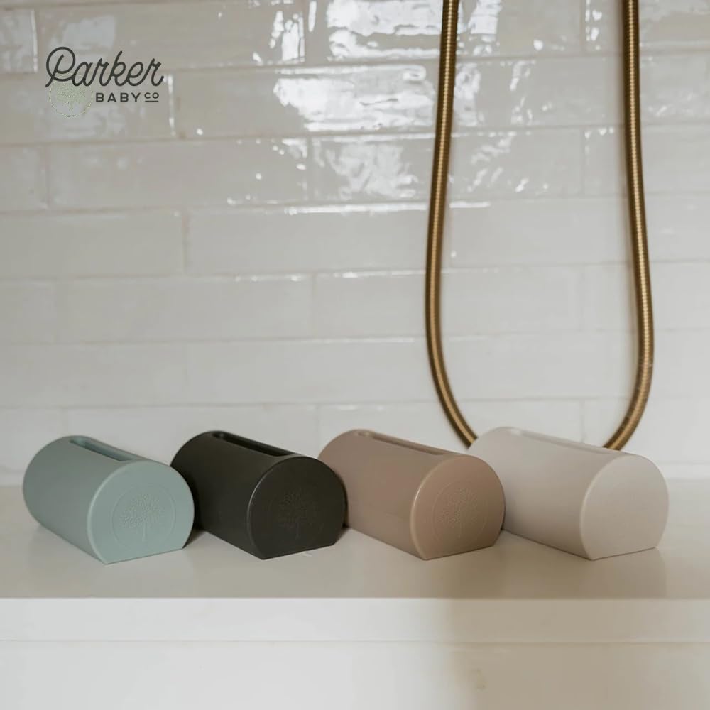 Parker Baby Co coordinated bath setup with bath caddy and rinse cup for a smoother routine.