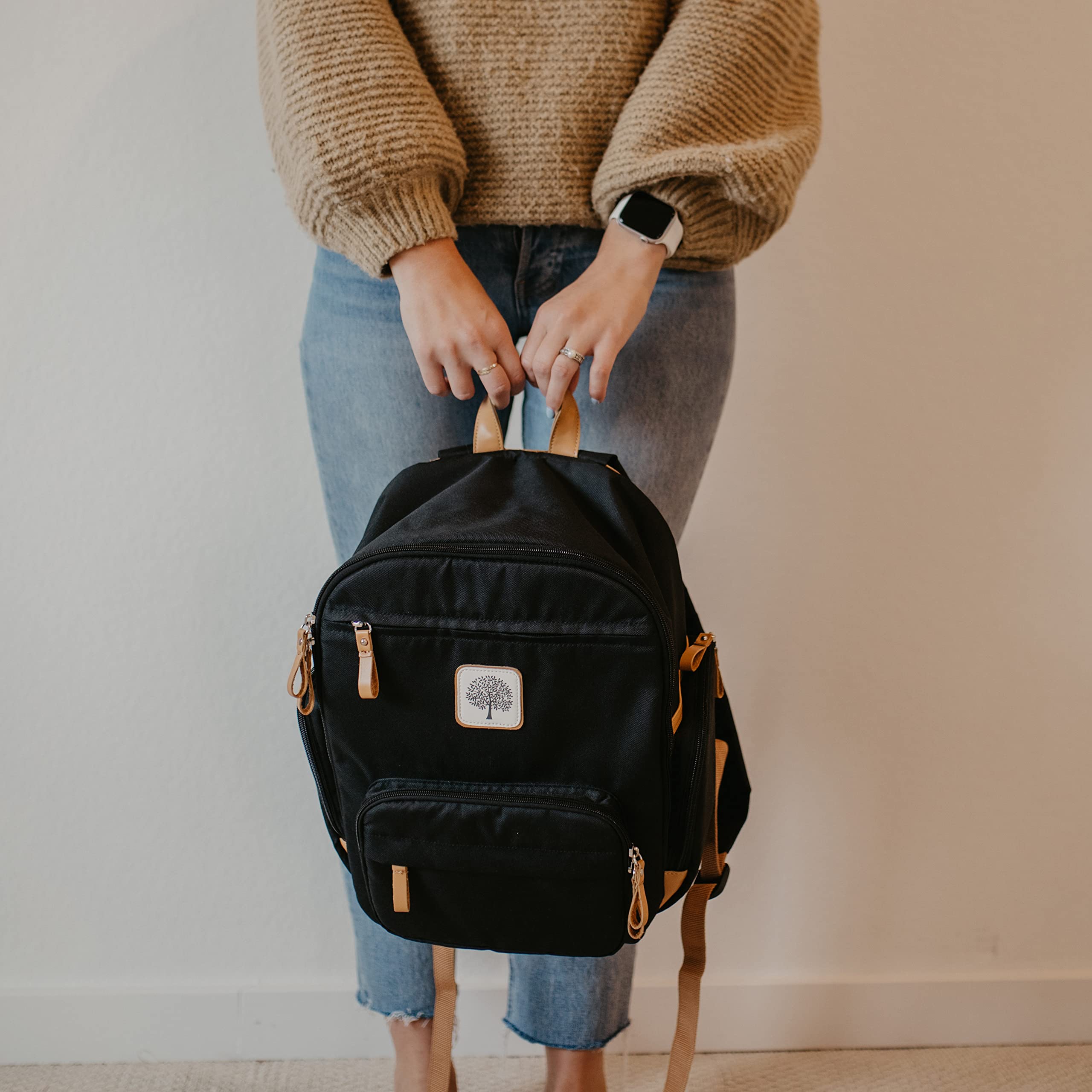 Parker Baby Co. diaper backpack durable zippers image suggests long-lasting performance.