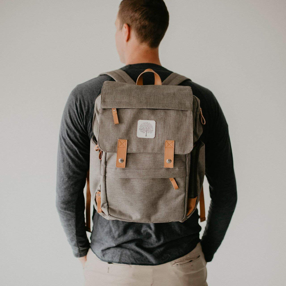 Parker Baby Co. Diaper Backpack features water-resistant canvas and vegan leather accents.