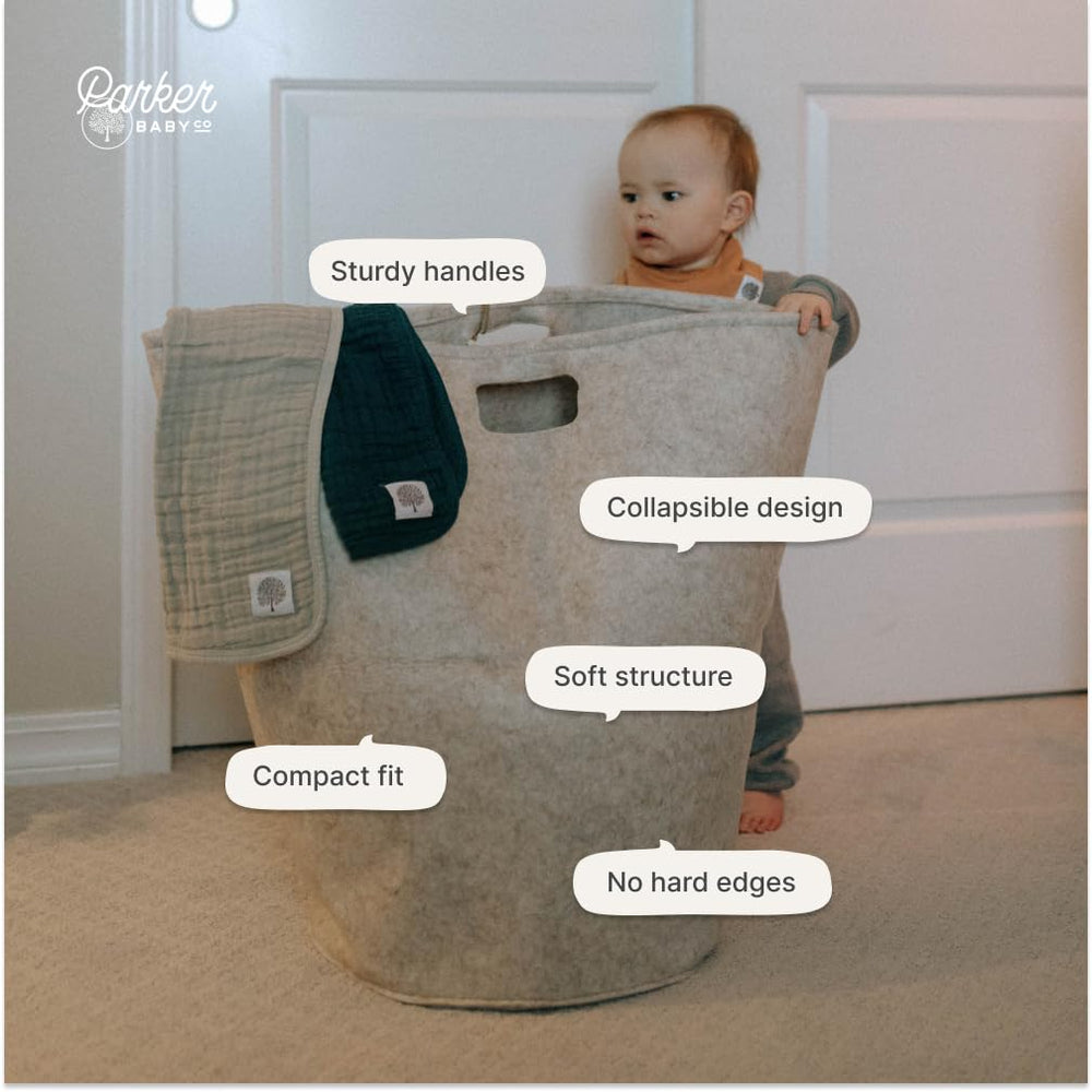 Parker Baby Co. gray hamper complements modern nursery decor.