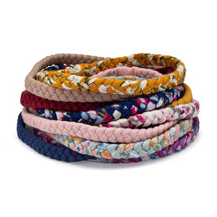 Parker Baby Co. toddler braided headbands on a child for secure, comfortable wear.