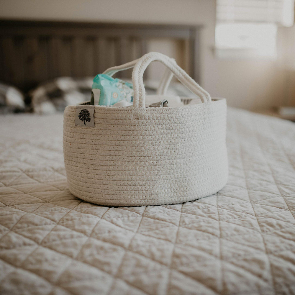Parker Baby Rope Diaper Caddy stores bath products and wipes neatly.