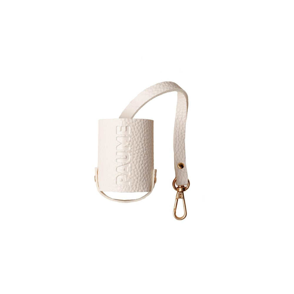PAUME Voyager Pouch clipped to backpack for on-the-go access