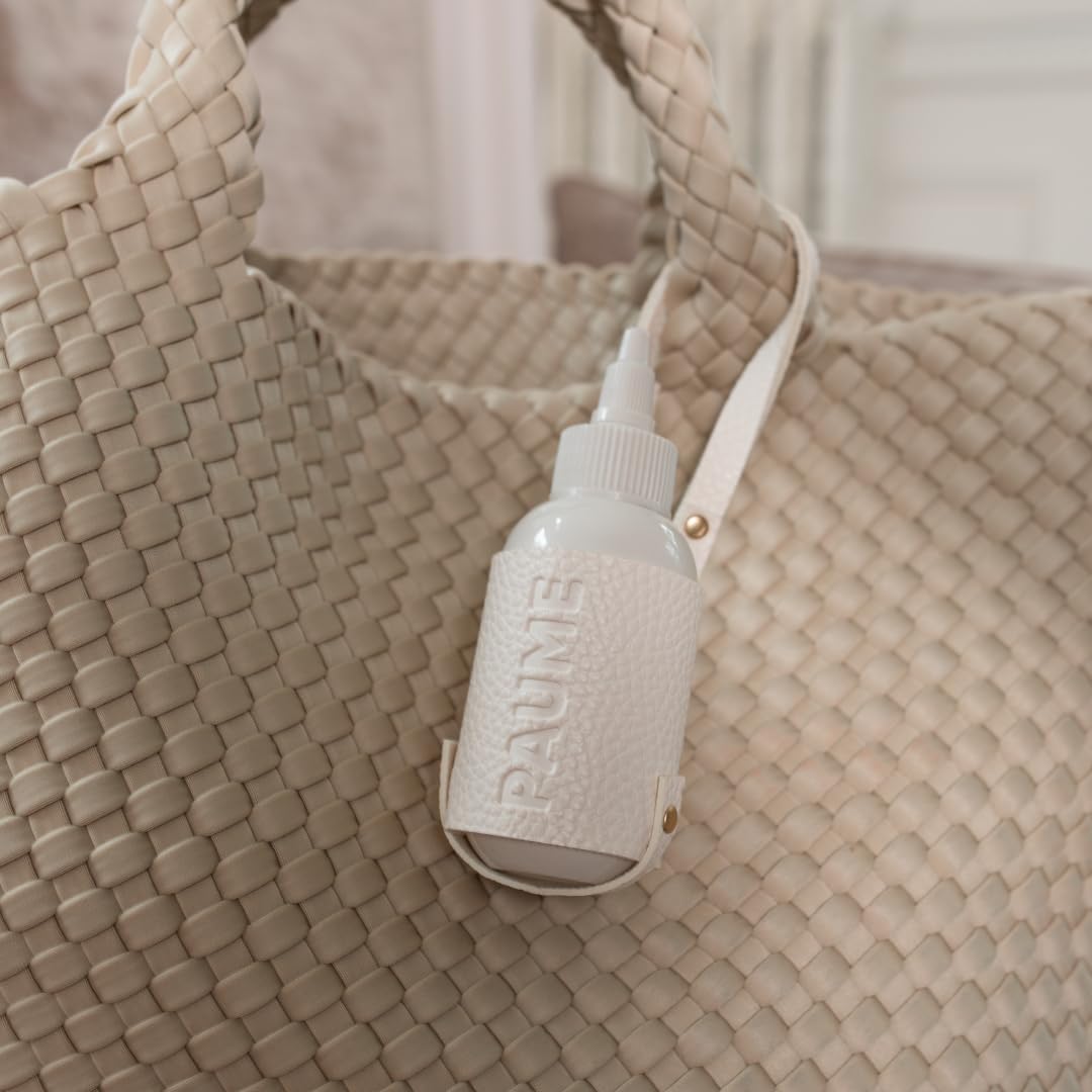 PAUME Voyager Pouch travel bottle slot demonstrates compatibility