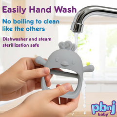 PBnJ Baby mitten teether doubles as pacifier alternative for infants.