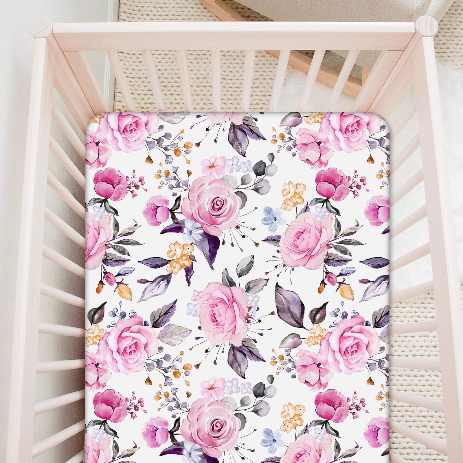 Pea Pod floral crib sheets are machine washable and color-friendly.