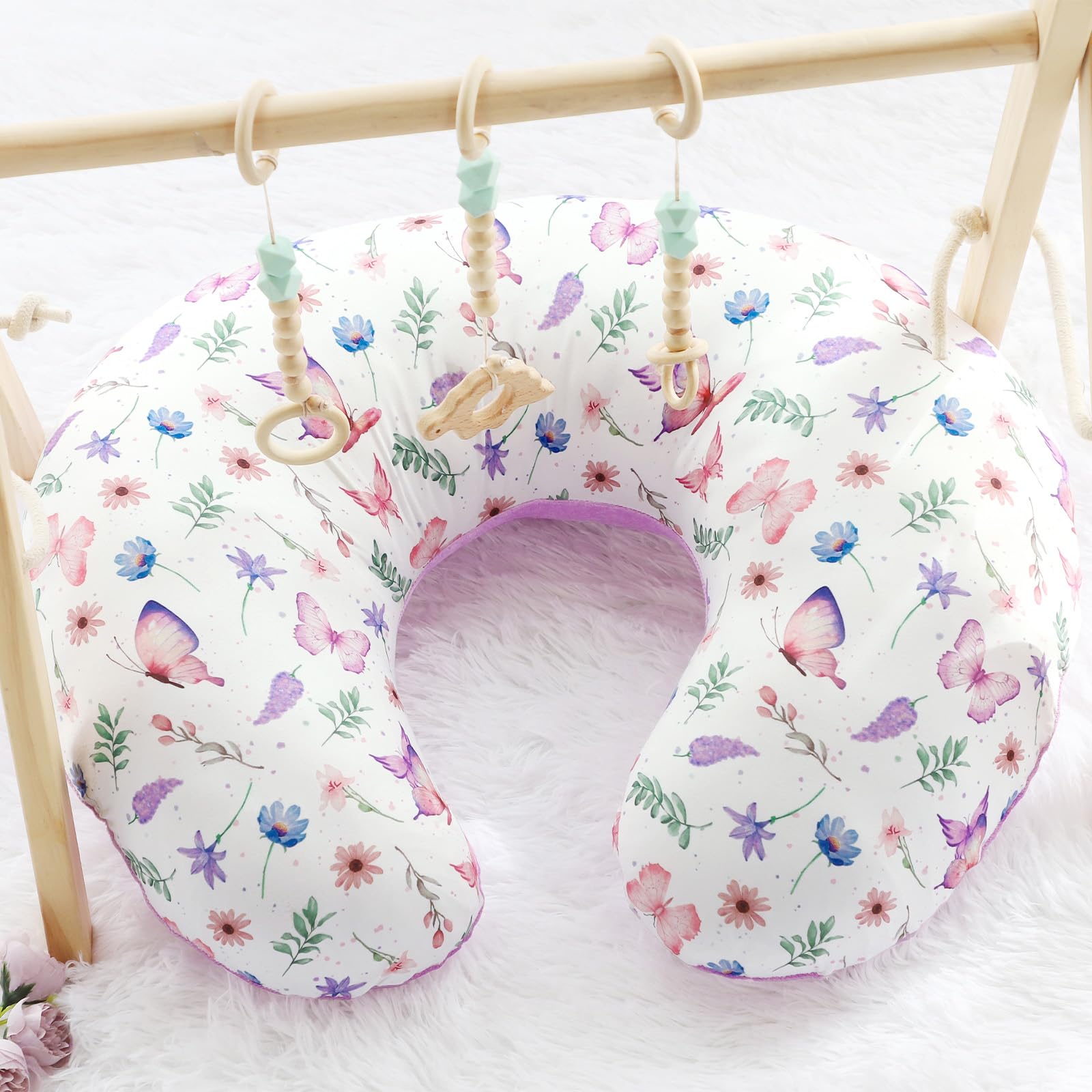 Pea Pod nursing pillow cover keeps baby comfortable during feedings.