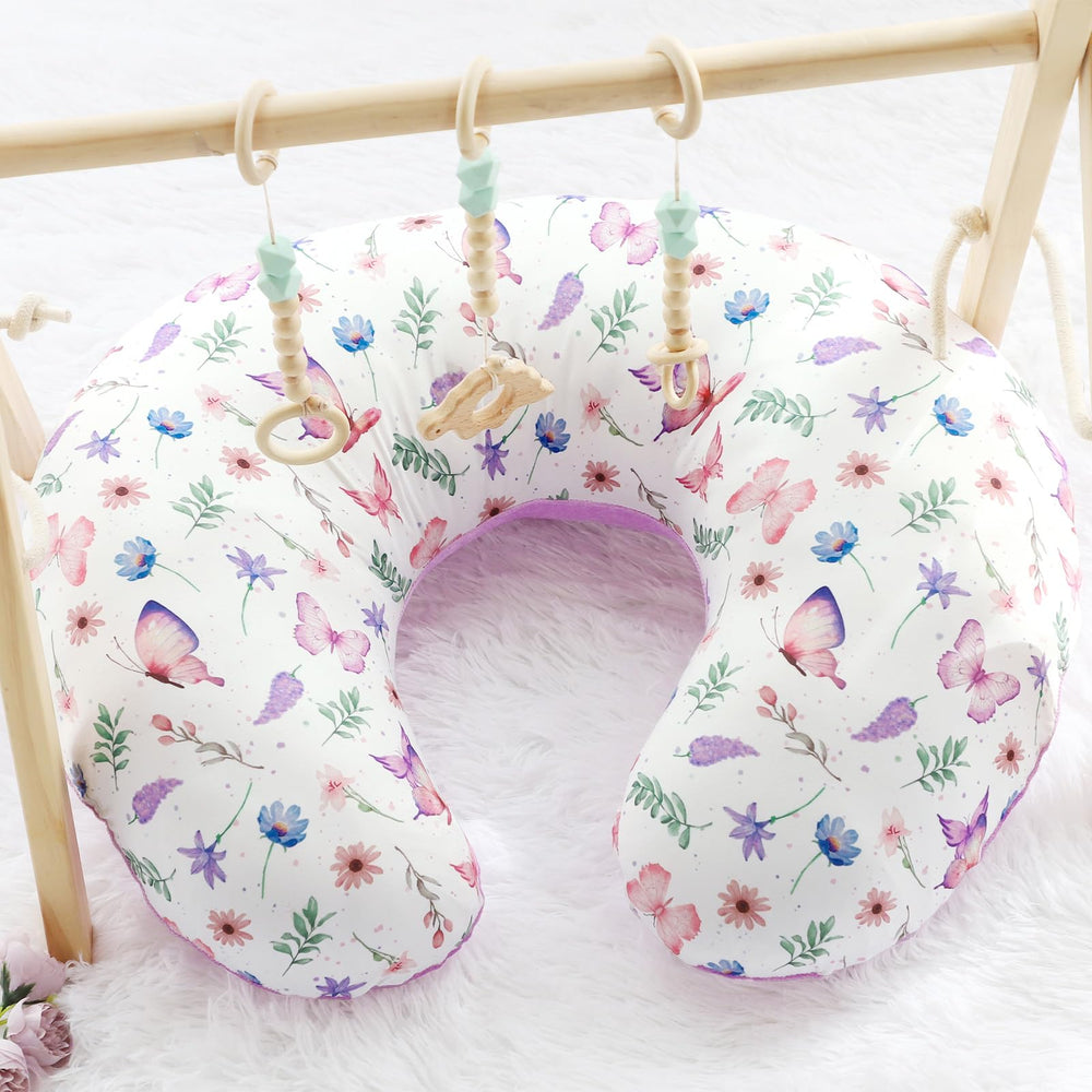 Pea Pod nursing pillow cover keeps baby comfortable during feedings.