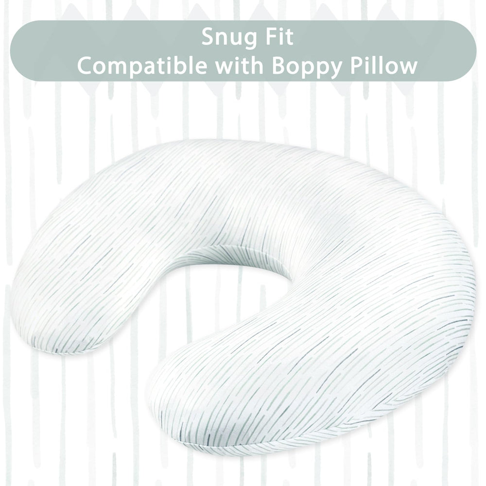 Pea Pod nursing pillow cover machine wash care close-up reveals easy cleaning.