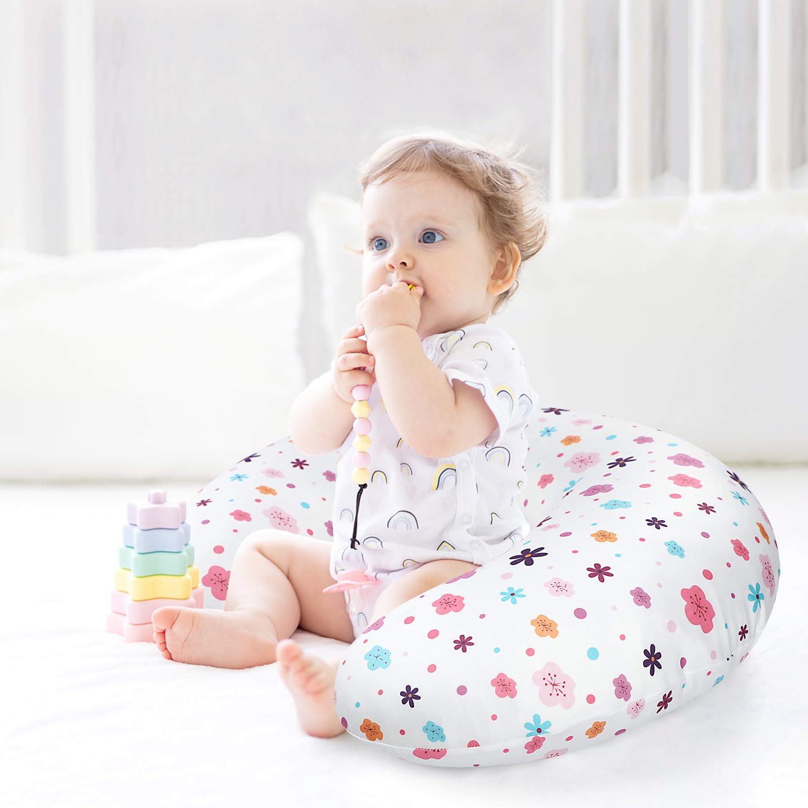 Pea Pod nursing pillow cover rainbow side-detail reveals soft-stretch fabric.