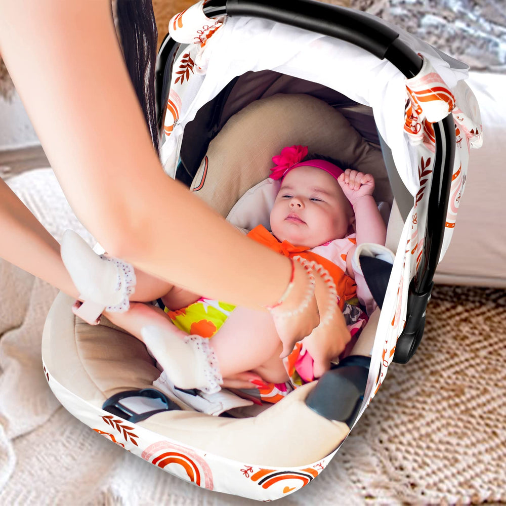 Vibrant rainbow pattern complements modern nurseries and travel gear.