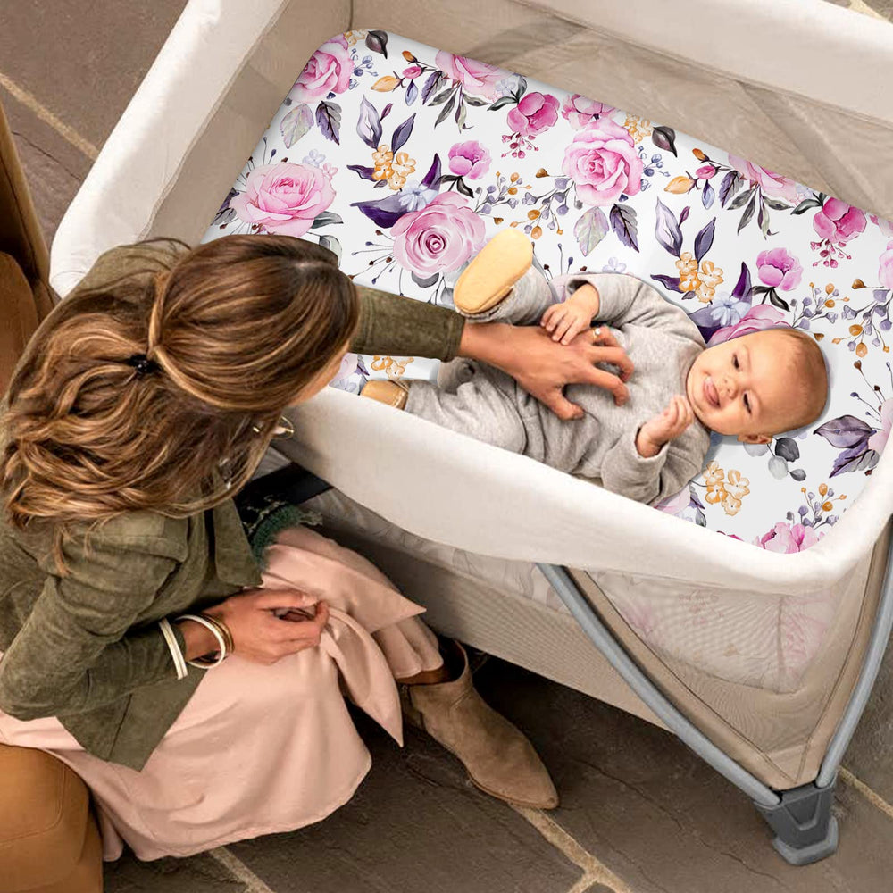 Pea Pod two-pack pack n play sheets offer convenient value.