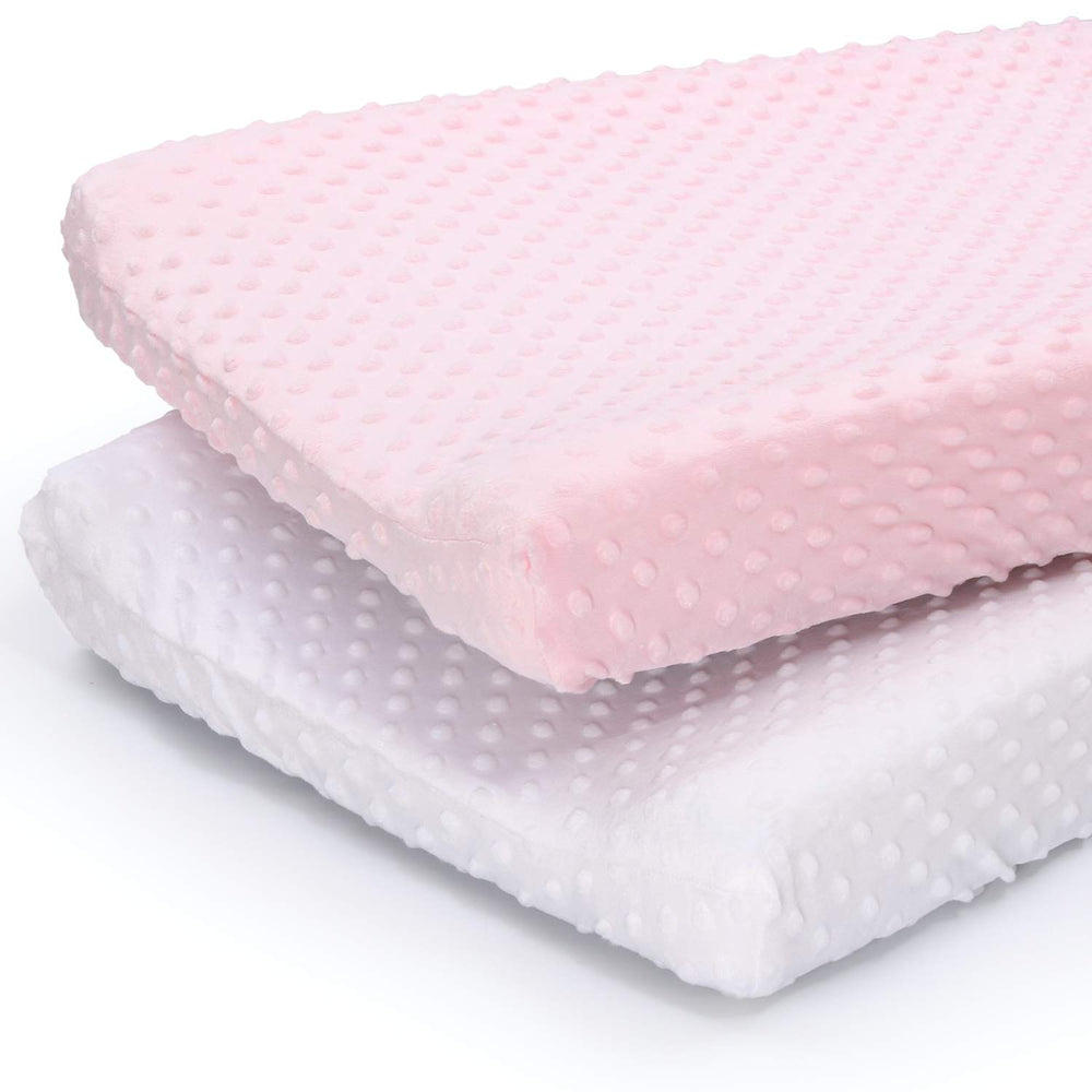 The Peanutshell changing pad cover pink white minky texture for comfortable diaper changes.