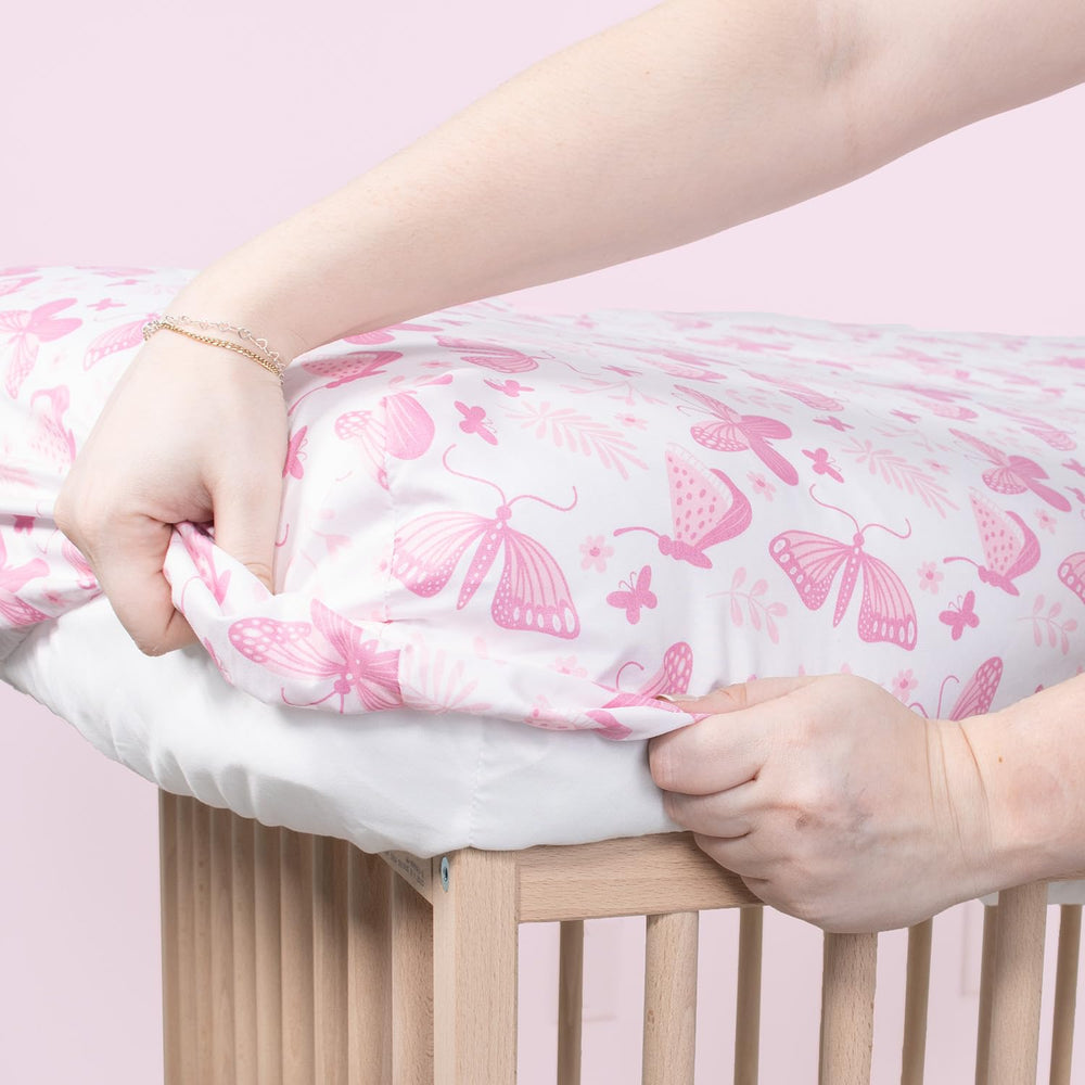 The Peanutshell butterfly sheets baby-nursery-decor showcases charming pink butterflies for nursery styling.