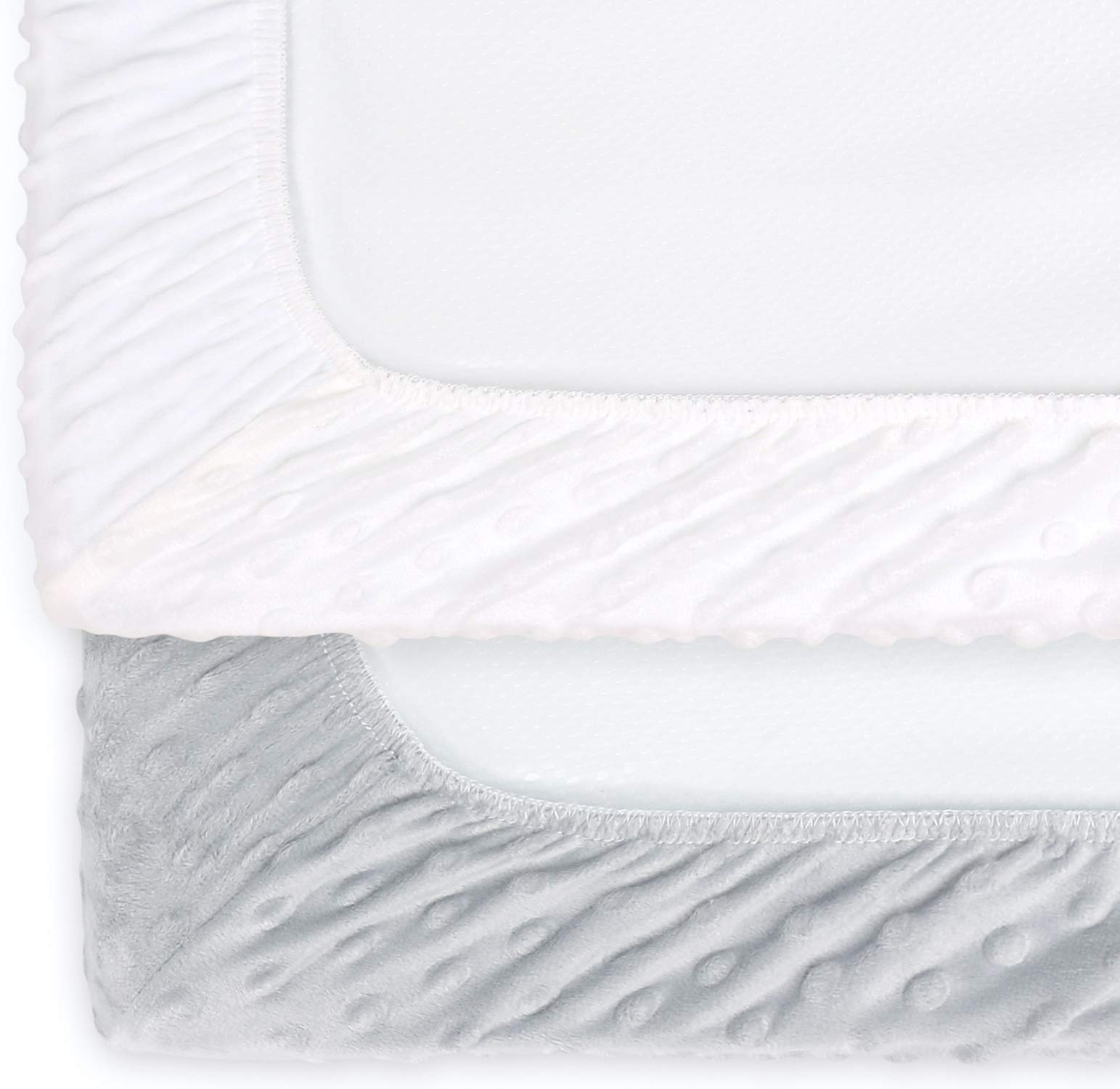 The Peanutshell changing pad cover with center buttonhole showing strap compatibility.