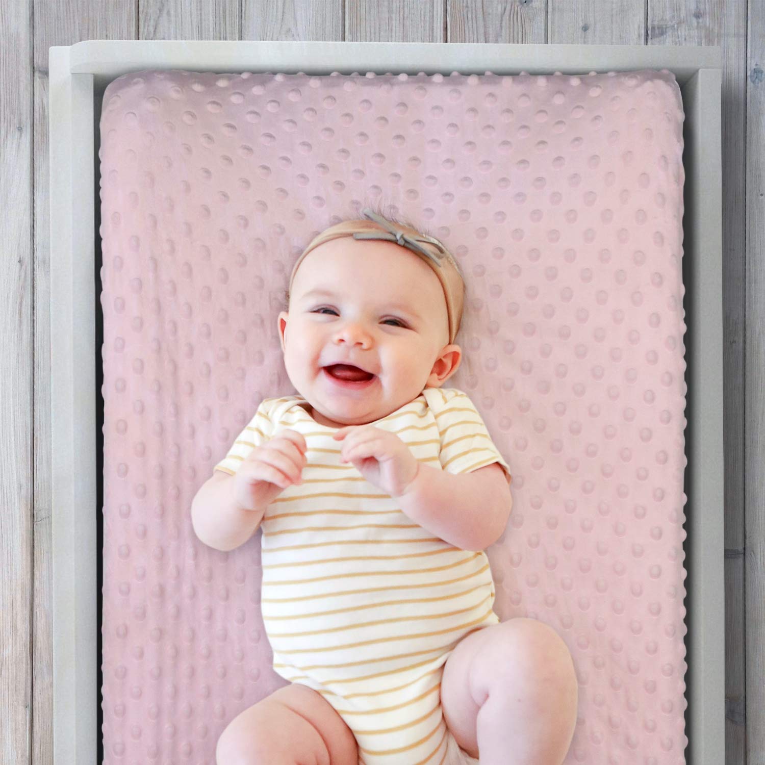 The Peanutshell changing pad cover with elastic bottom band for a secure fit.