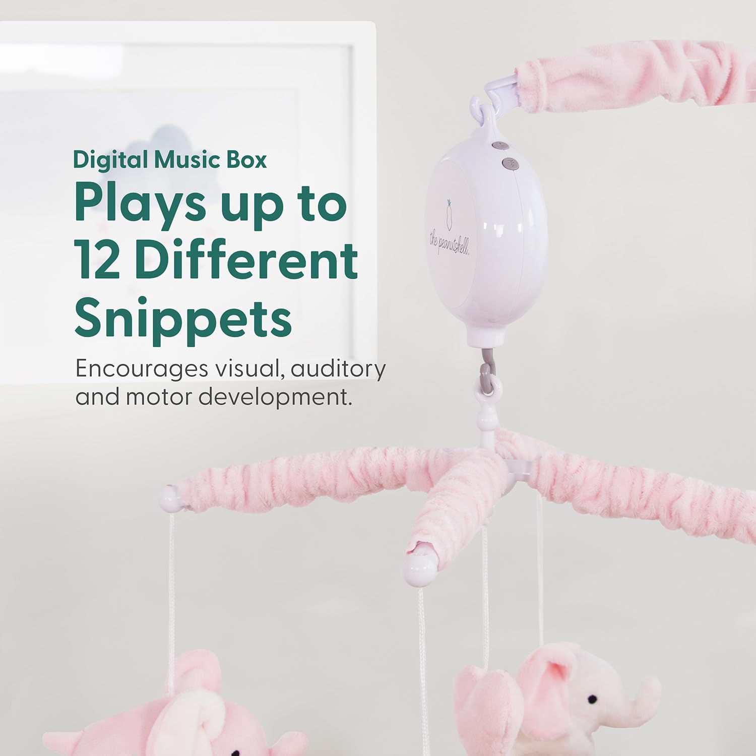 The Peanutshell crib mobile elephants rotating arm demonstrates soothing visual motion for bedtime