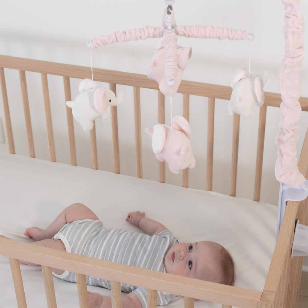 The Peanutshell crib mobile girls pink ambience complements modern nursery design