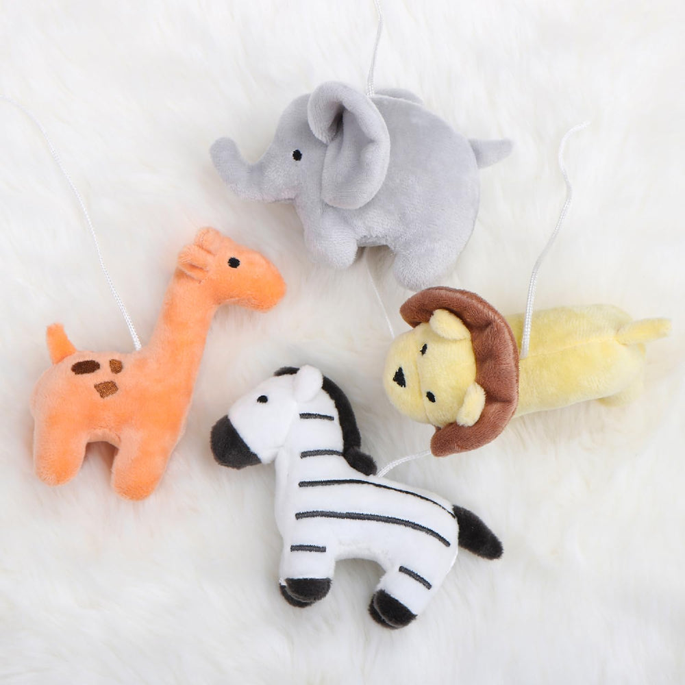 The Peanutshell crib mobile rotation feature adds visual movement for baby.