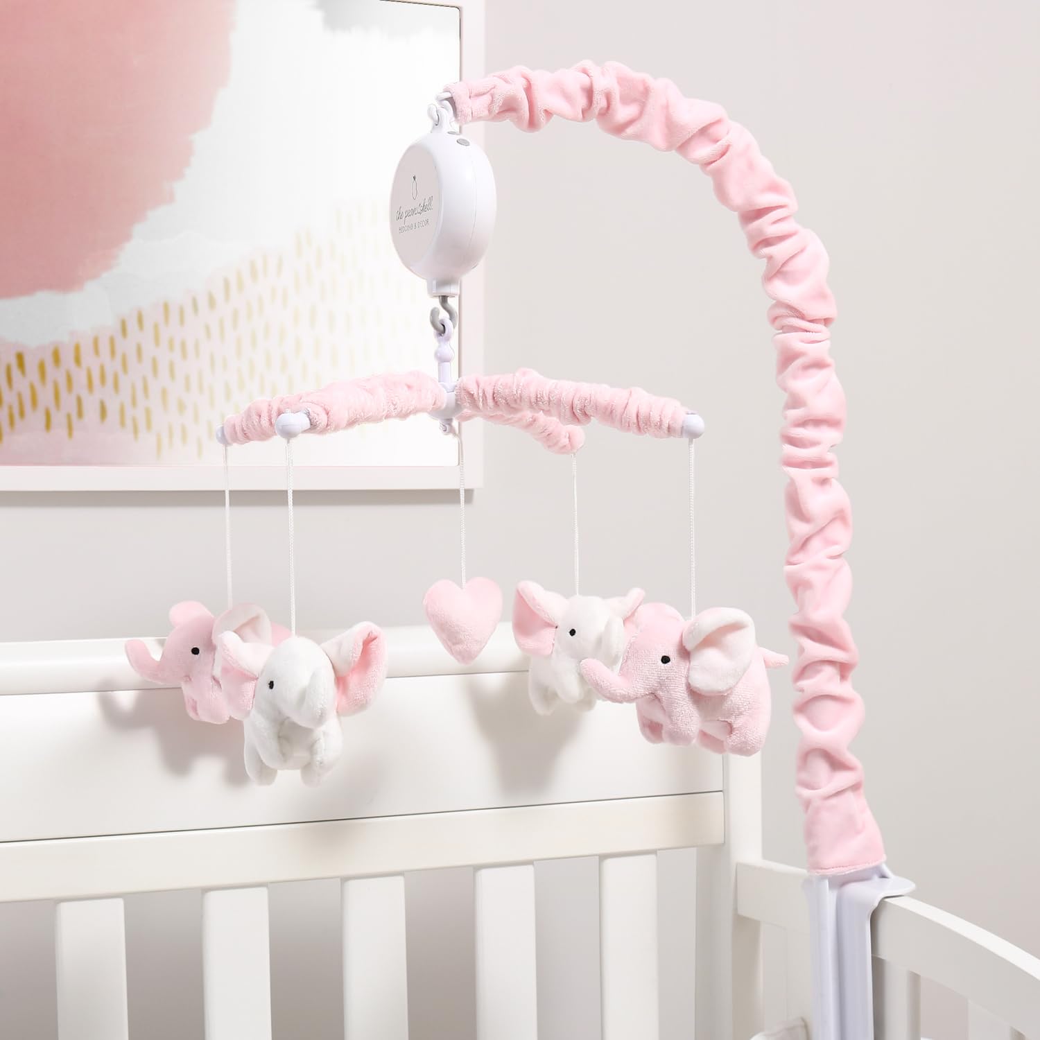 The Peanutshell crib mobile volume control helps tailor sound to nursery ambience