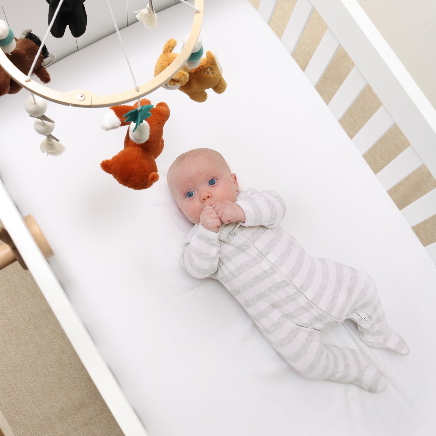 The Peanutshell Crib Mobile Western Woods adds charming nursery decor.