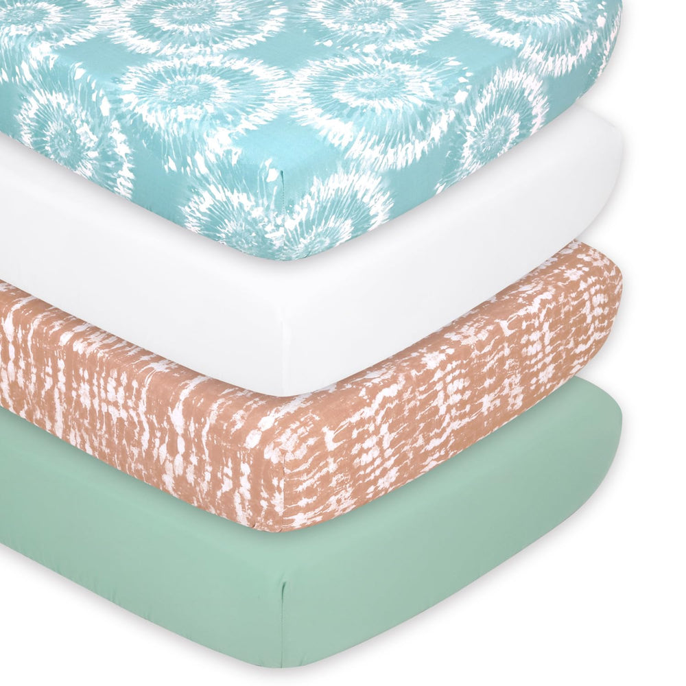 The Peanutshell crib sheets 4-pack white: soft, breathable comfort for nursery sleep.