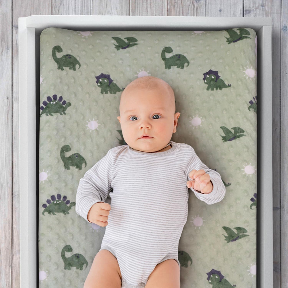 The Peanutshell changing pad cover with soft minky dot velour delivers cozy comfort.