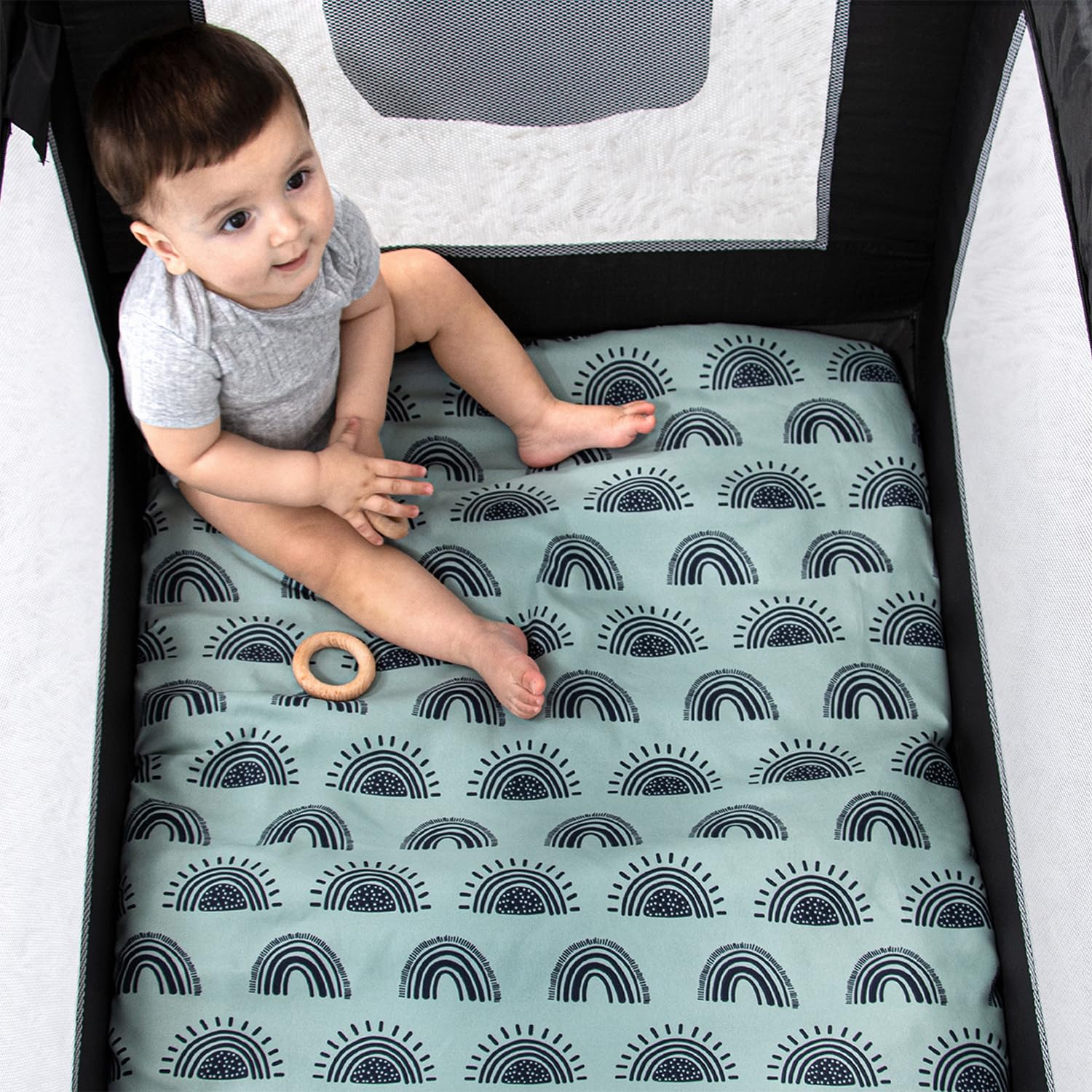 The Peanutshell pack-n-play-mattress closeup features universal-fit practicality for travel cribs.