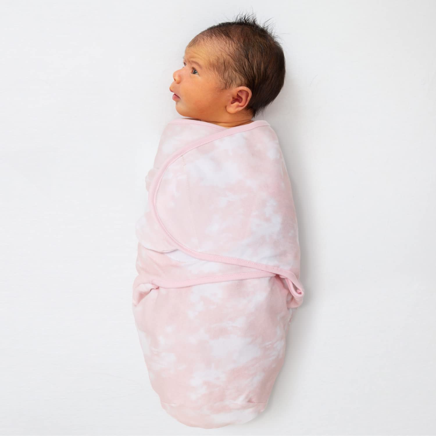 The Peanutshell pastel tie-dye swaddle offers soft textures for cozy swaddling