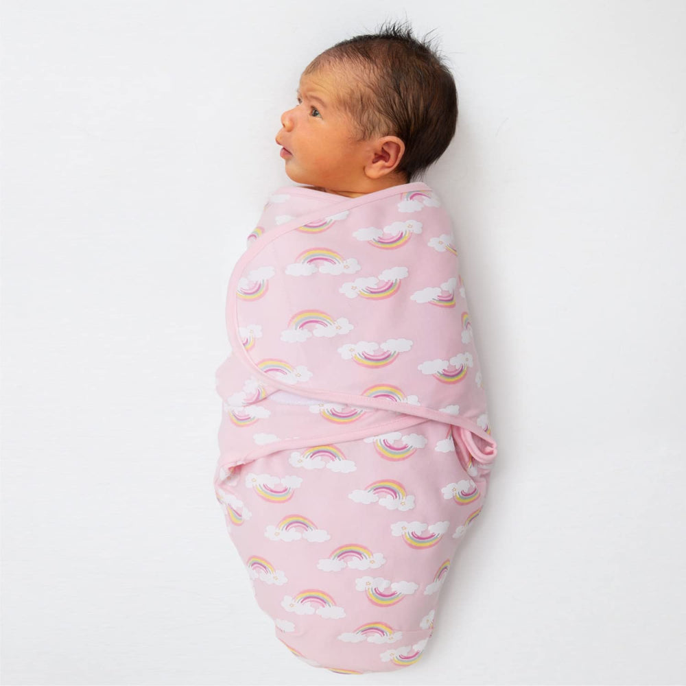 The Peanutshell rainbow print swaddle supports visual comfort during swaddling