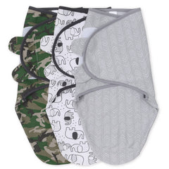 The Peanutshell swaddle set in olive camouflage offers a cozy, secure nap.