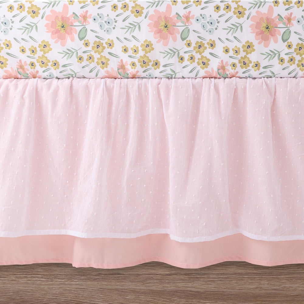 The Peanutshell Wildflower soft pink mint theme captures cheerful, calming nursery aesthetics.