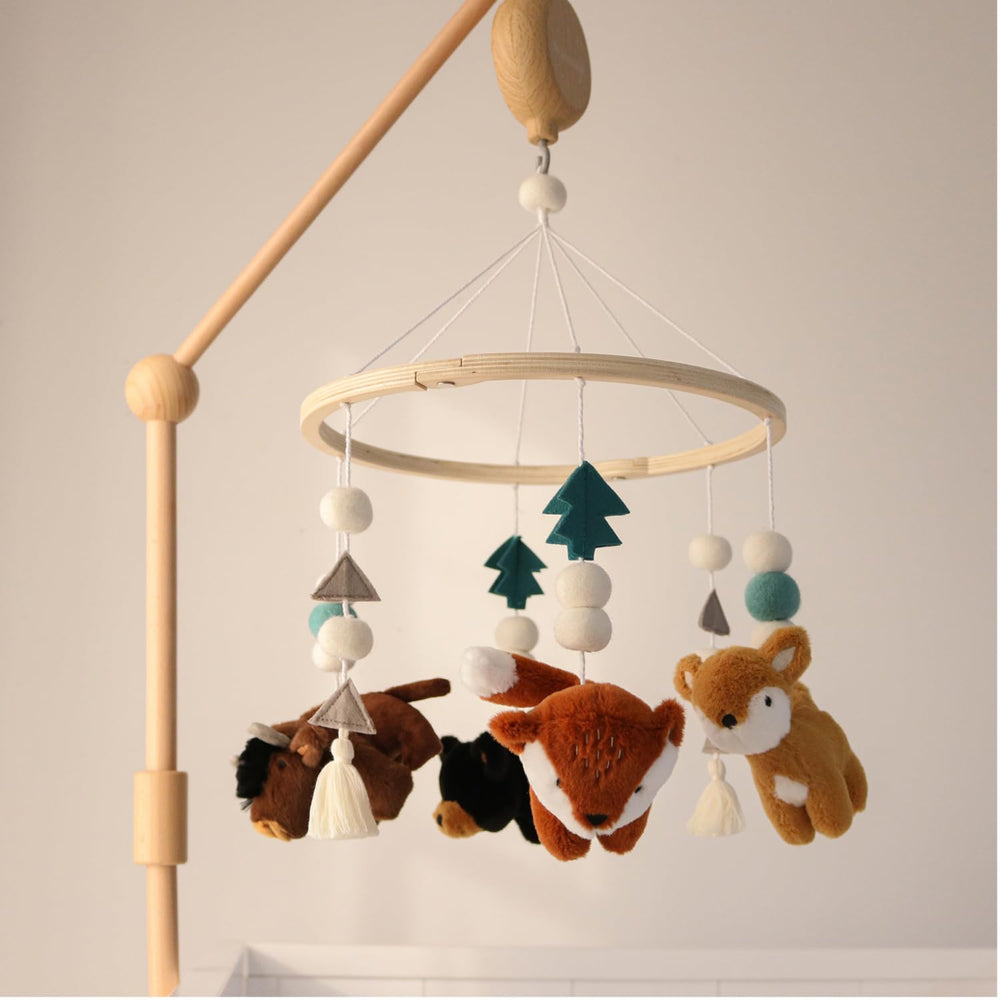 The Peanutshell Crib Mobile features a detachable arm for easy moving and storage.