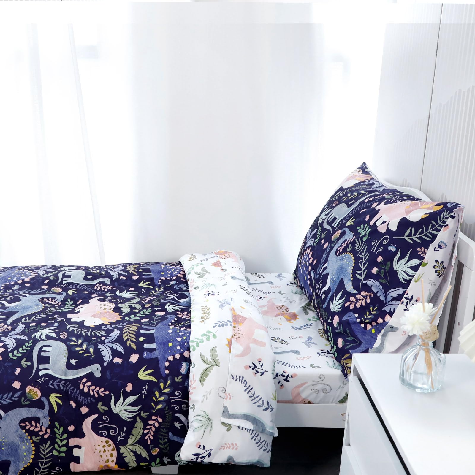 Pea Pod dinosaur bedding set colorful pattern closeup appeals to kids' imagination and decor style