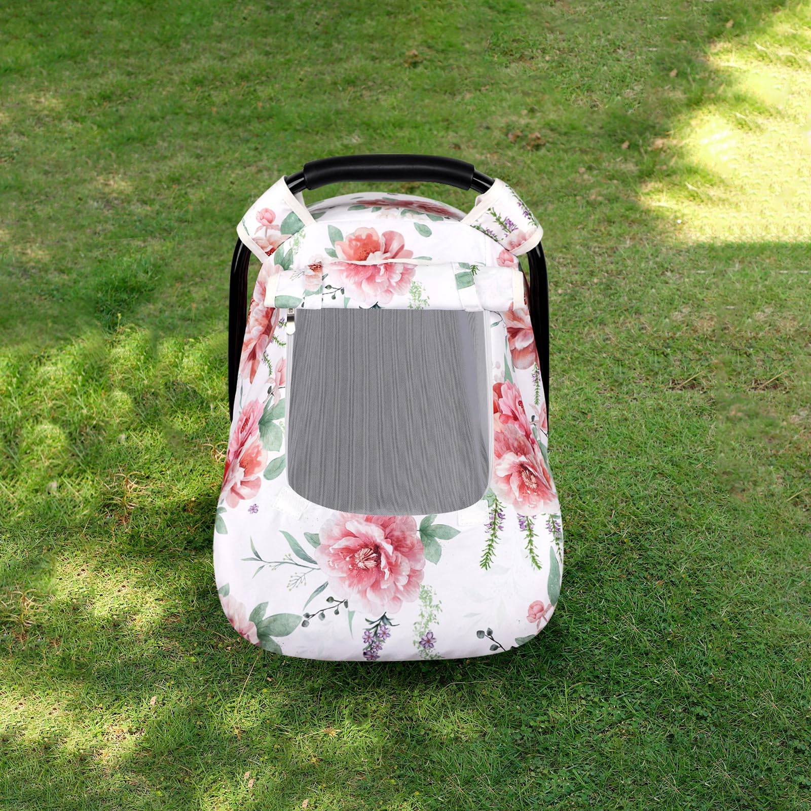 Pea Pod floral car seat cover wind protection for chilly rides.