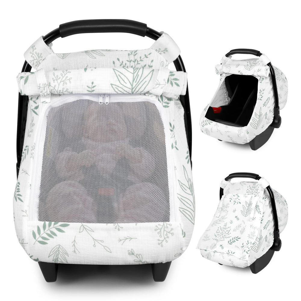 Pea Pod Muslin Car Seat Cover leaf-pattern fabric closeup demonstrates breathable, gentle cotton texture.