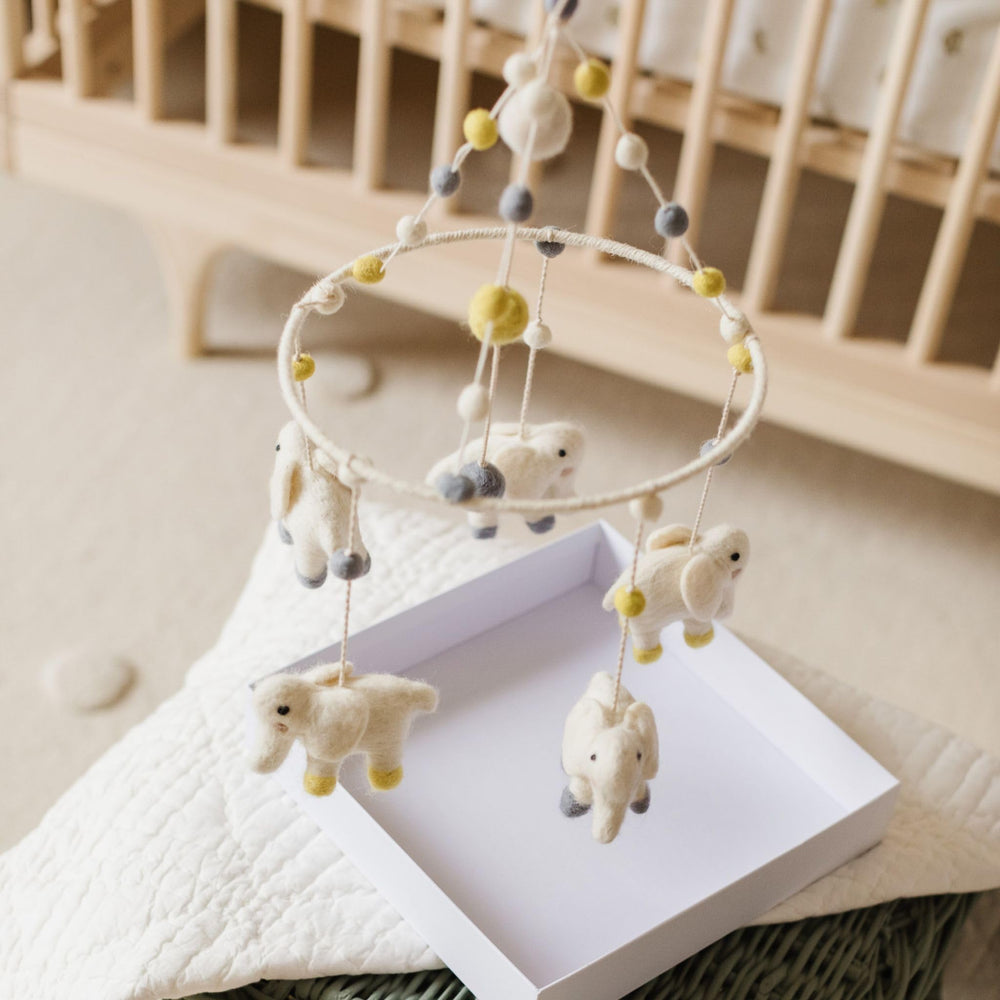 PEHR mobile uses AZO-free dyes for safe, vibrant ceiling decor in nurseries.