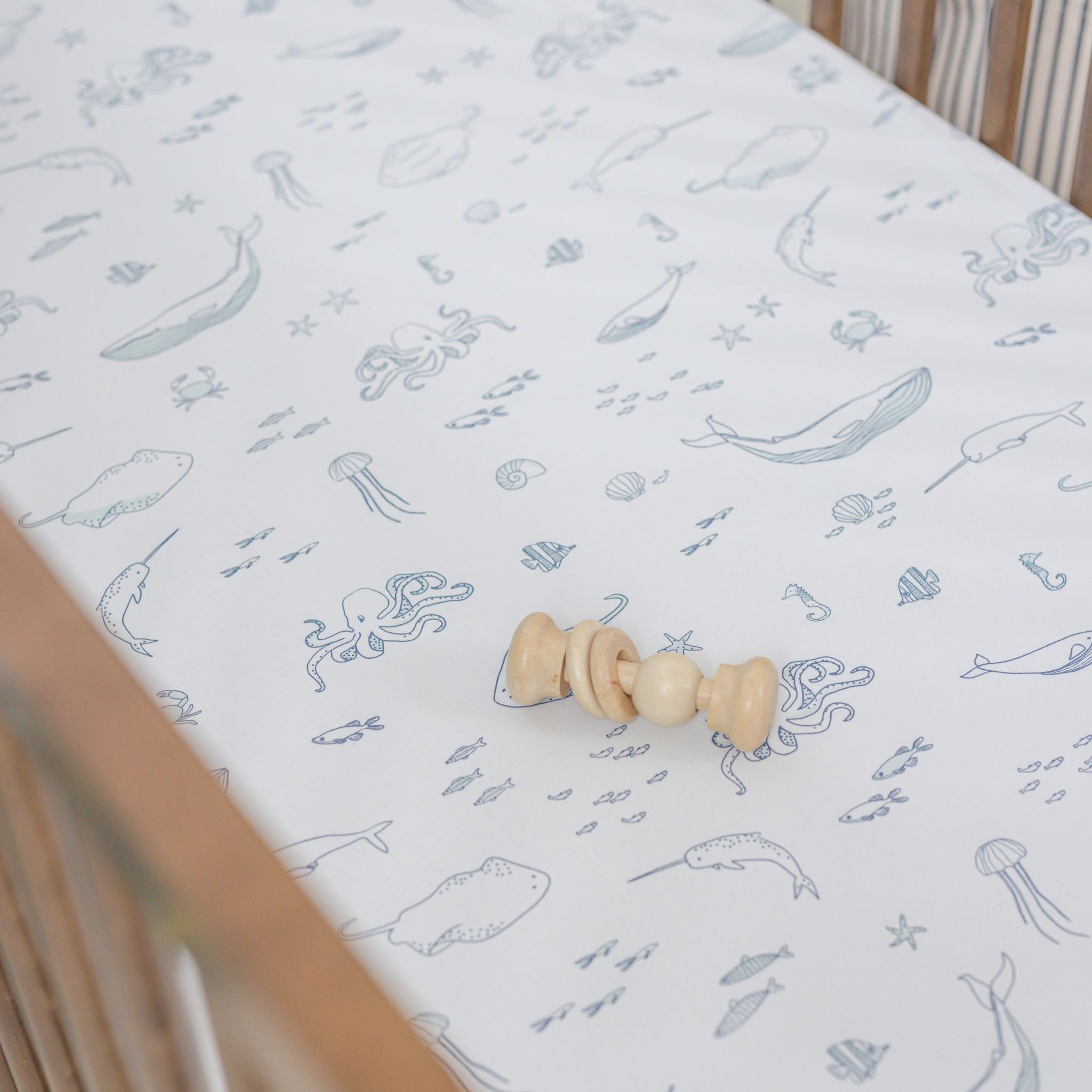PEHR Life Aquatic crib sheet features hand-printed design with AZO-free dyes.