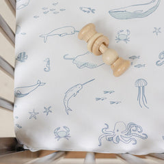 PEHR Life Aquatic crib sheet shows snug fit on standard crib.
