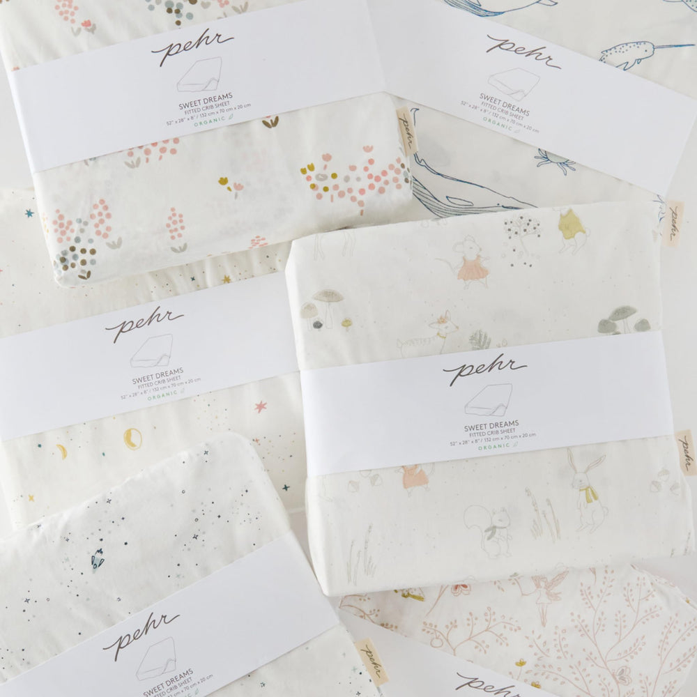 PEHR Life Aquatic crib sheet ships in sustainable packaging for mindful living.